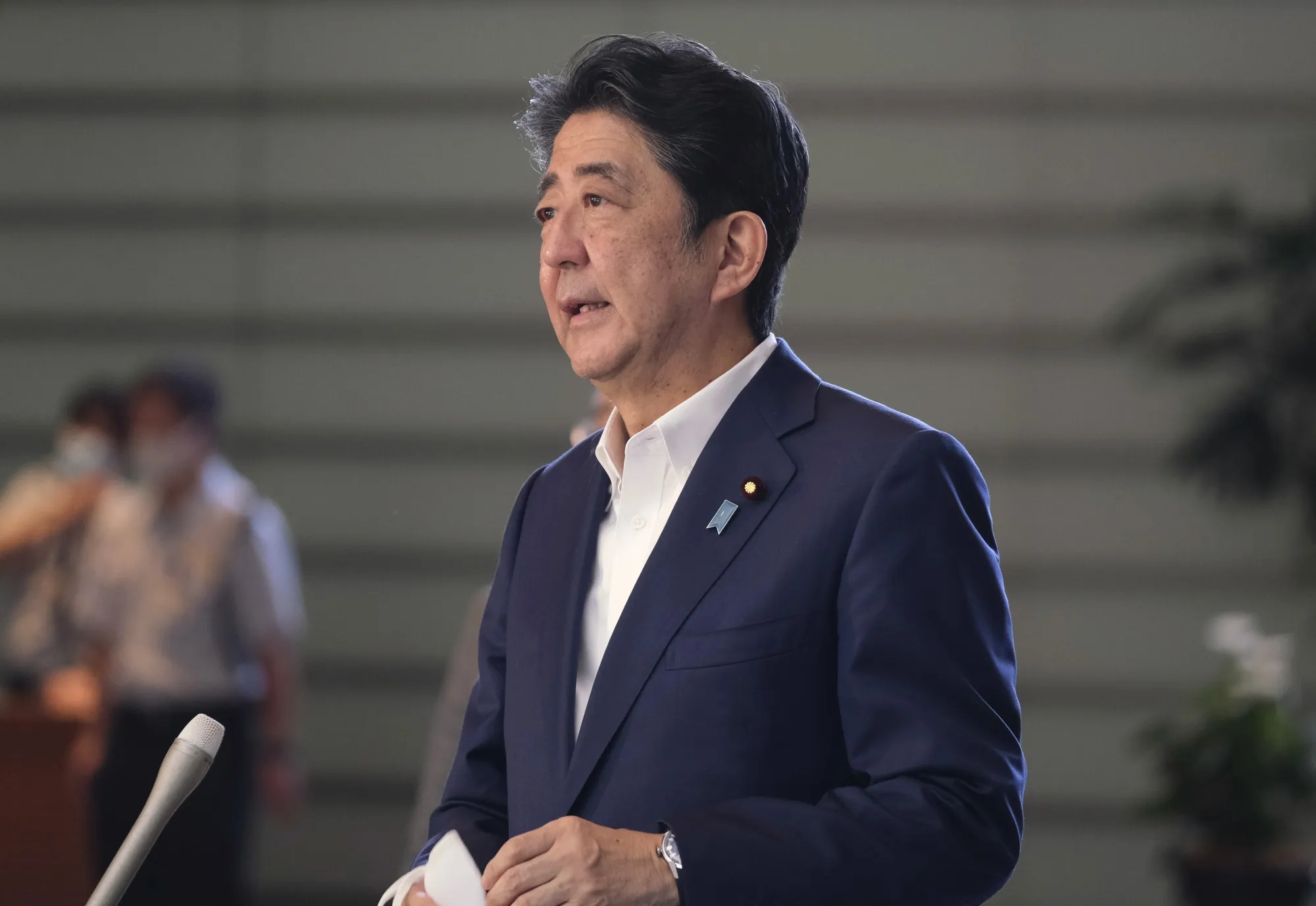 Shinzo Abe speaks to the media on Aug. 19.