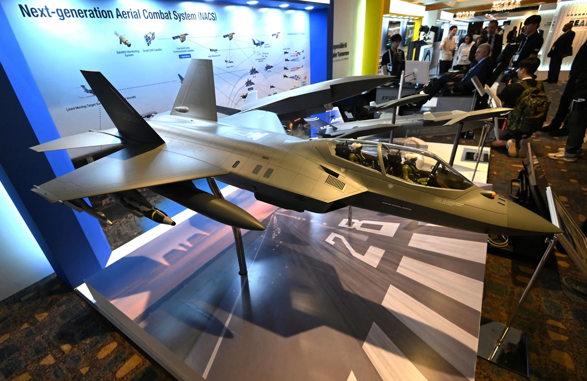 A KF-21 fighter jet model&nbsp;at the Responsible AI in the Military Domain&nbsp;summit in Seoul on Sept. 10.