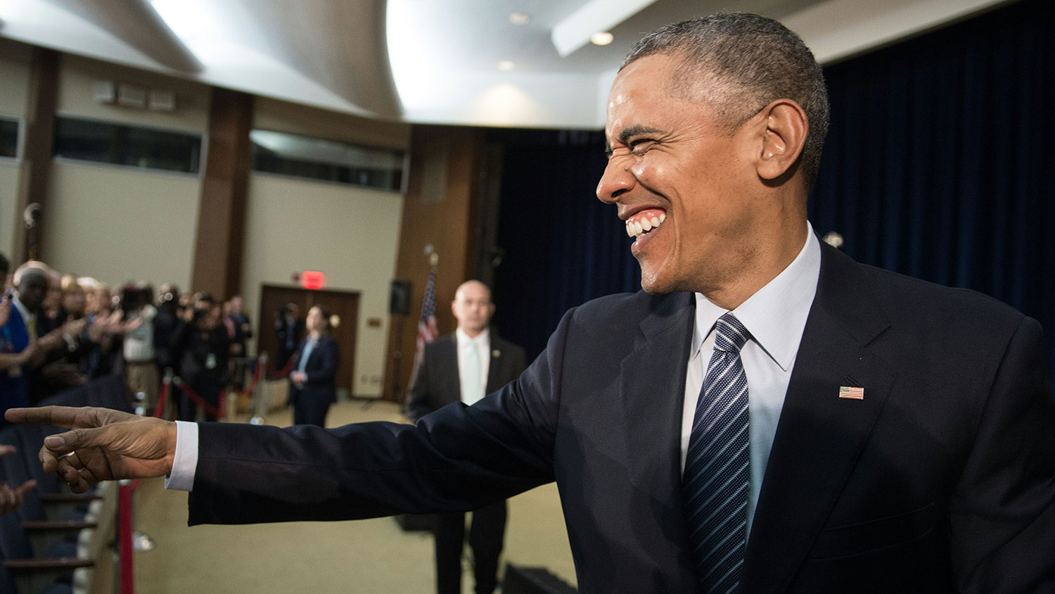 President Barack Obama greets an attendee at the Chief of Missions conference at the State Department in Washington on March 14, 2016.
