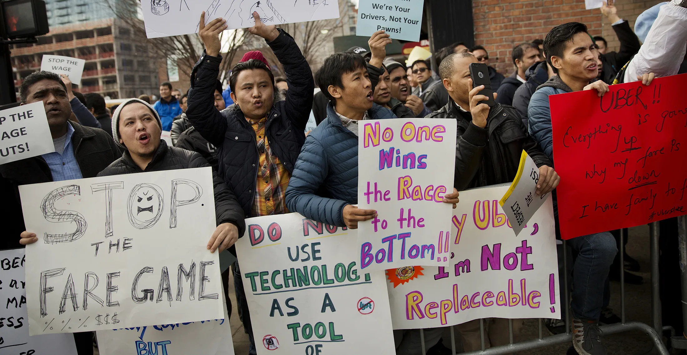 Drivers for Uber protest outside the company's offices in Long Island City, in the Queens borough of New York, on Feb. 1, 2016.
