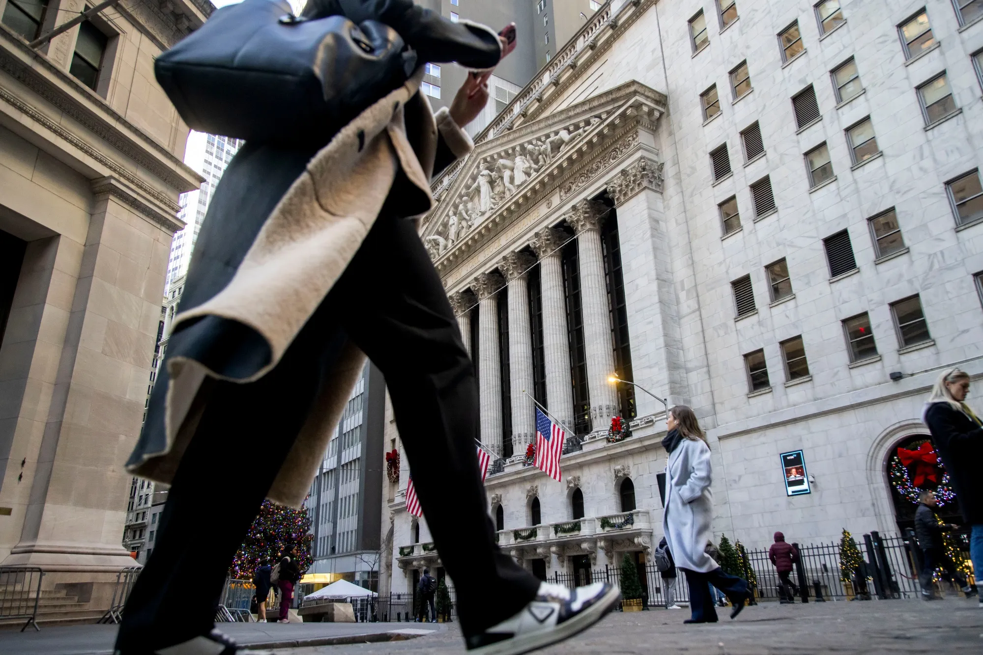 Pedestrians outside the New York Stock Exchange in New York.