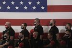 U.S. Border Patrol agents wearing &quot;Trump&quot; and &quot;MAGA&quot; protective masks participate in the pledge of allegiance during a campaign rally for U.S. President Donald Trump at Yuma International Airport in Yuma, Arizona, U.S., on Tuesday, Aug. 18, 2020. Trump portrayed Joe Biden as soft on illegal immigration in a speech Tuesday afternoon near the southern U.S. border, reprising a central theme of his 2016 campaign.