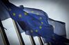 European Union (EU) flags fly outside the the European Commission headquarters, in Brussels, Belgium, on Monday, Dec. 19, 2011. European finance ministers will today seek to meet a self-imposed deadline for drawing additional aid to the debt crisis and to form new budget rules as investor confidence that a comprehensive solution is achievable wanes.