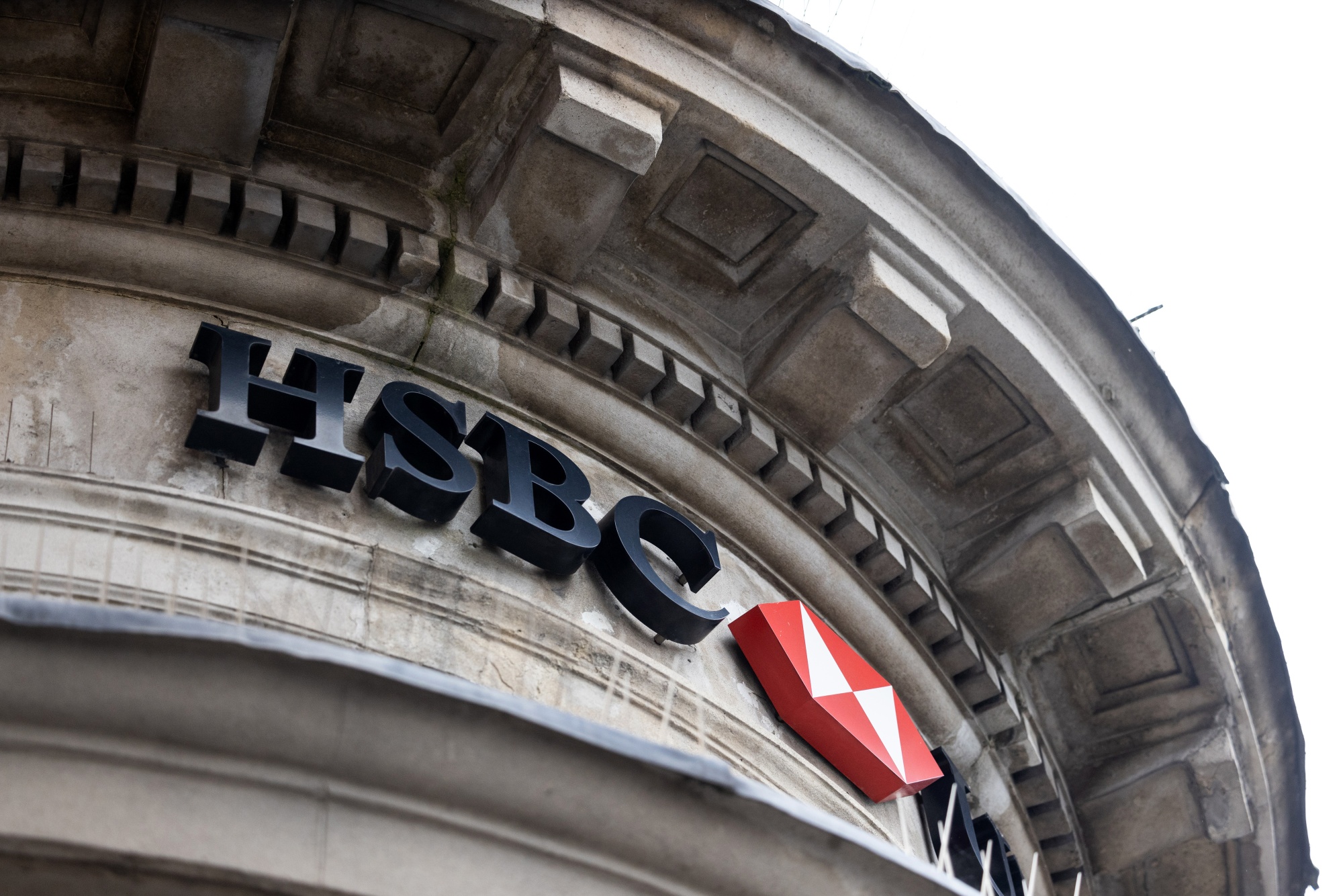 A sign above an HSBC Holdings Plc bank branch in St. Albans, UK, on Monday, July 22, 2024. HSBC are due to report their interim reults on July 31. Photographer: Chris Ratcliffe/Bloomberg