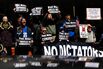 Activist Demonstrate Against Paul Weiss Law Firm, After It Agreed To Trump Administration's Terms