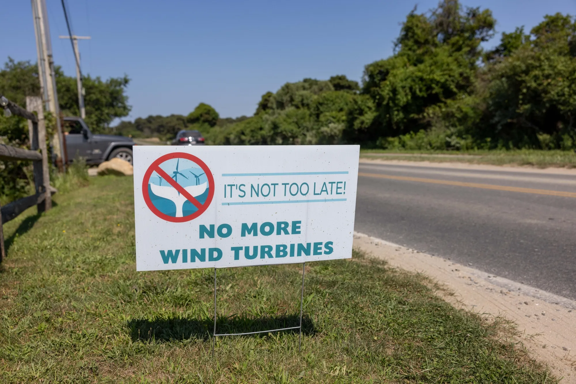 An anti-windmill lawn sign on a road near Cisco Beach in Nantucket.