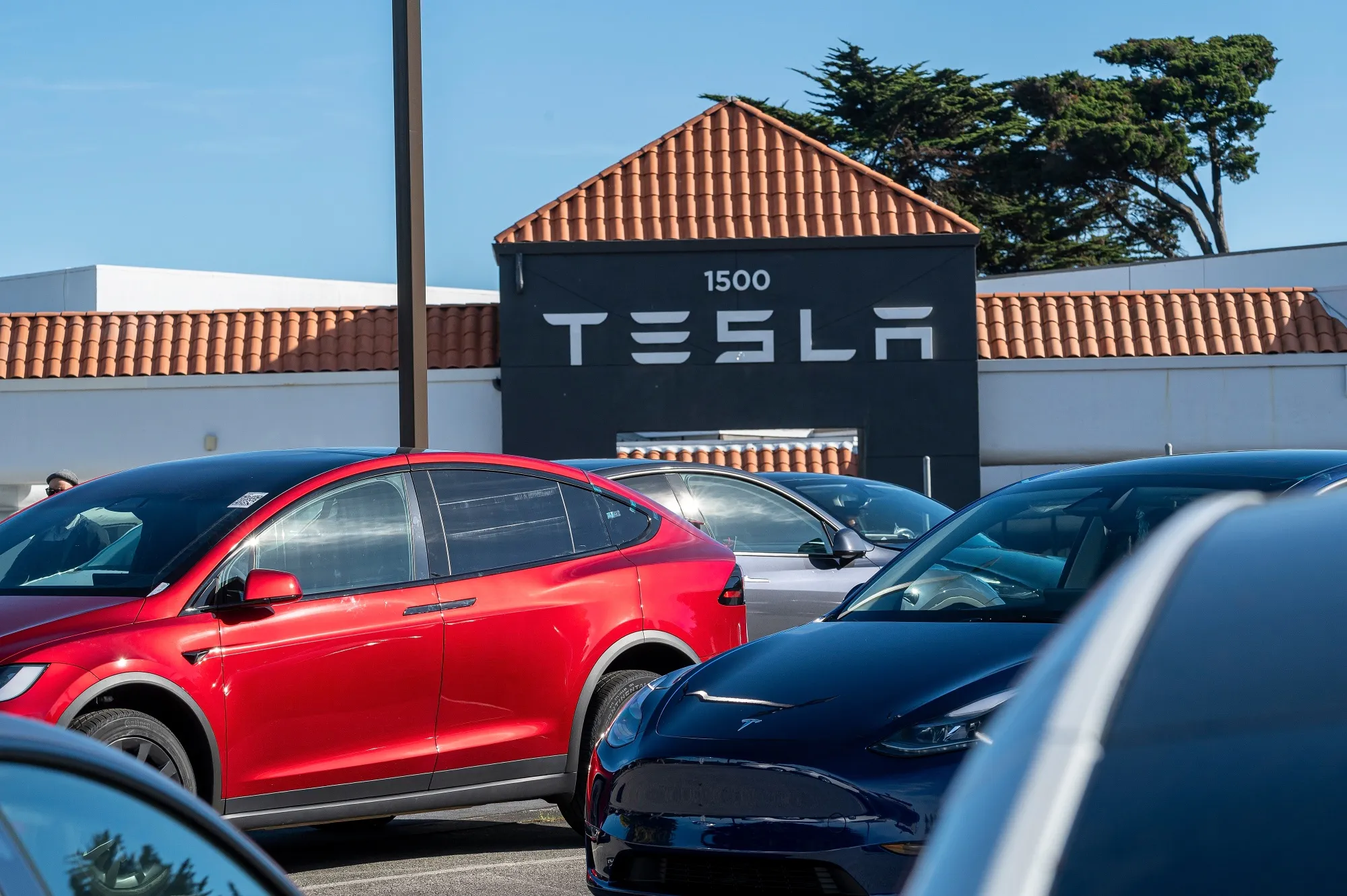 Vehicles at a Tesla store in Colma, California.