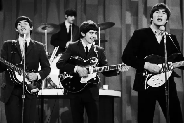 The Beatles (from left), Paul McCartney, Ringo Starr, George Harrison, and John Lennon, perform for the CBS "Ed Sullivan Show" in New York on Feb. 9, 1964