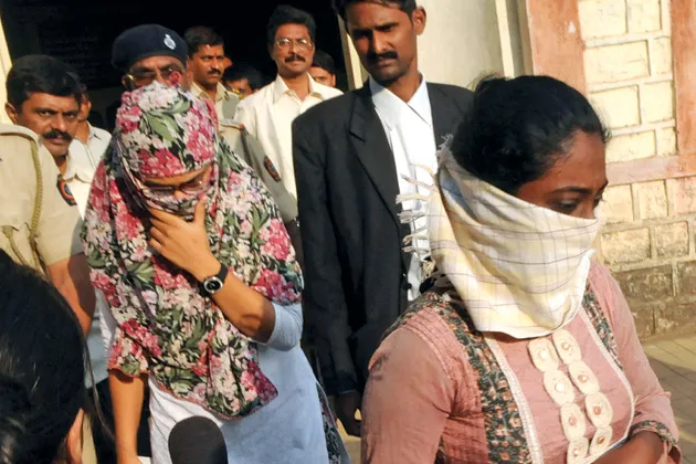 Shaheen Dhada (left) and a friend were charged for her critique of Bal Thackeray