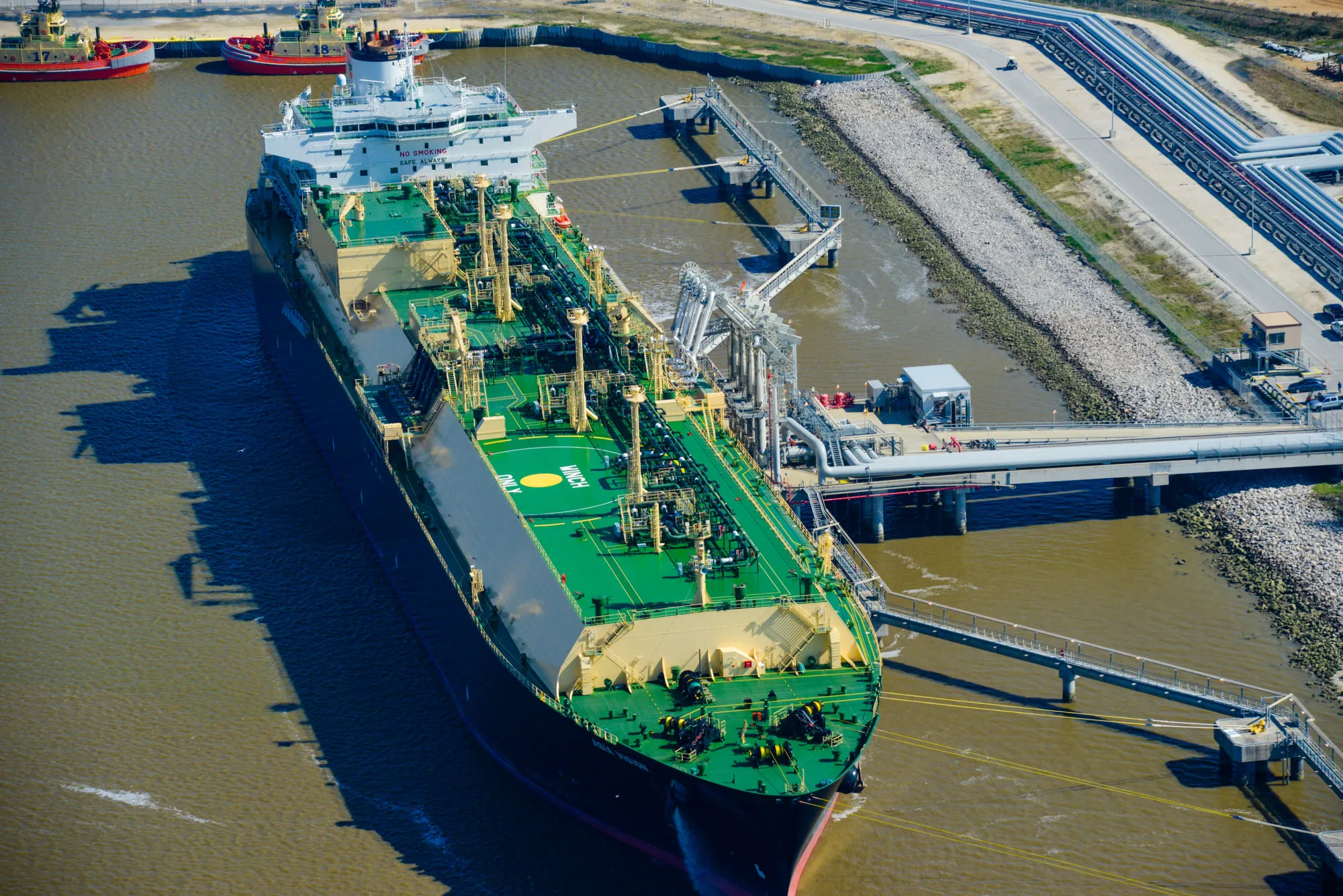 A LNG carrier ship sits docked at the Cheniere Energy Inc. terminal in this aerial photograph taken over Sabine Pass, Texas, U.S.