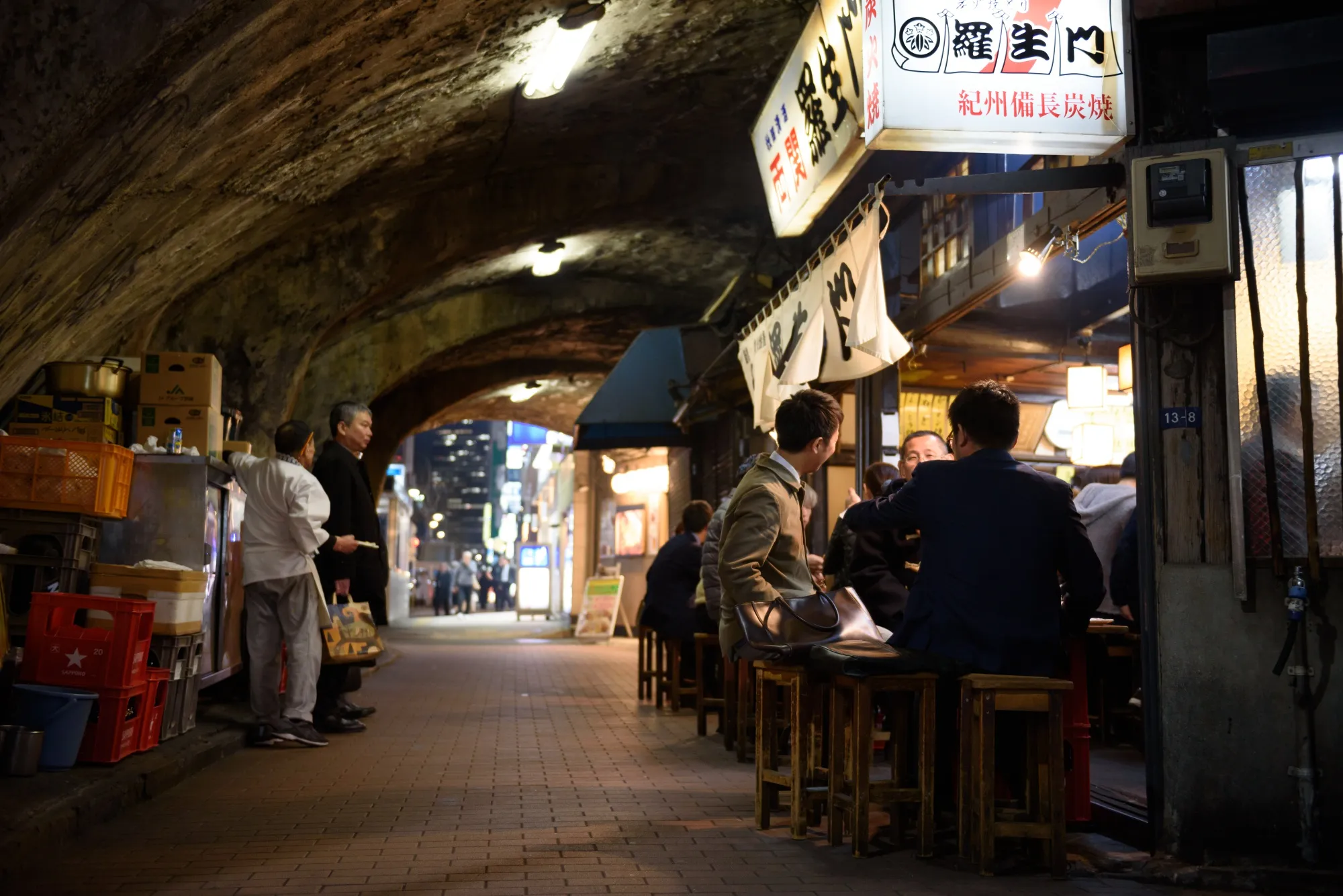 Customers dine at an izakaya bar in Tokyo, Japan, on Friday, March 22, 2019.