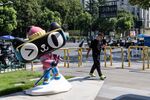 A statue of Alibaba Group Holding Ltd.'s T-Mall mascot at a shopping mall near the company's headquarters in Hangzhou, China, on Thursday, Oct. 9, 2025. Alibaba has established an in-house team for robotics, joining major global firms in a race to build AI-powered physical products.