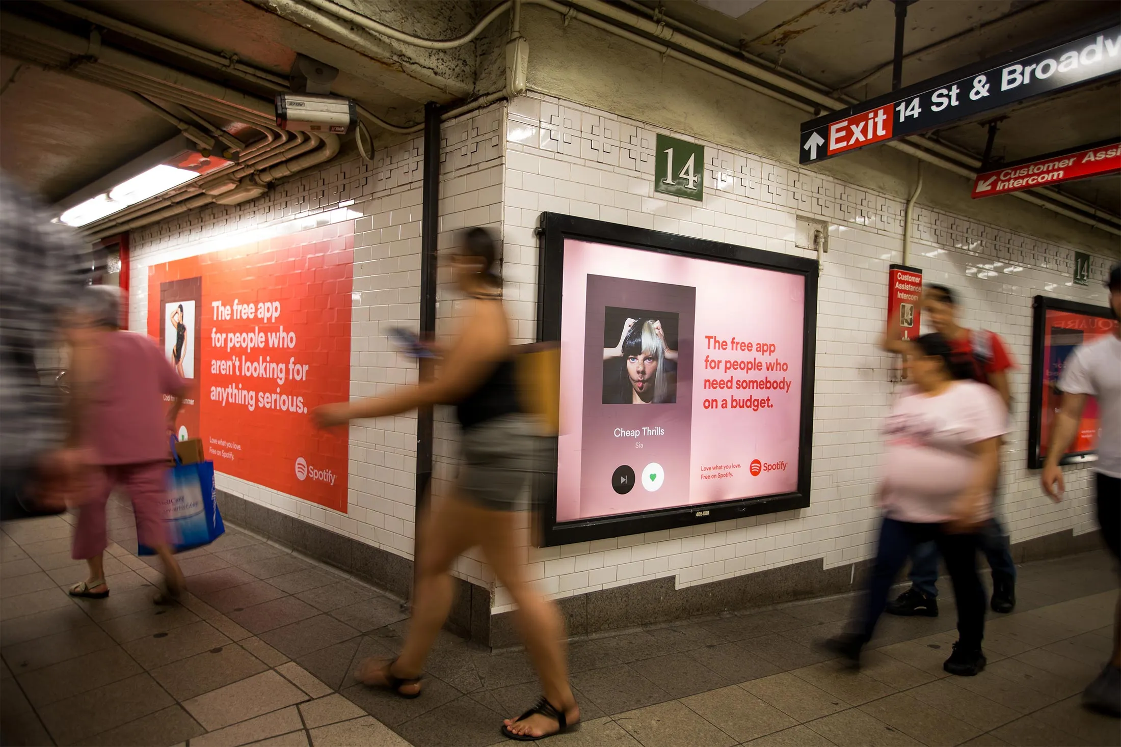 Subway riders pass Spotify&nbsp;ads&nbsp;in the Union Square subway station in New York, on&nbsp;May 25.