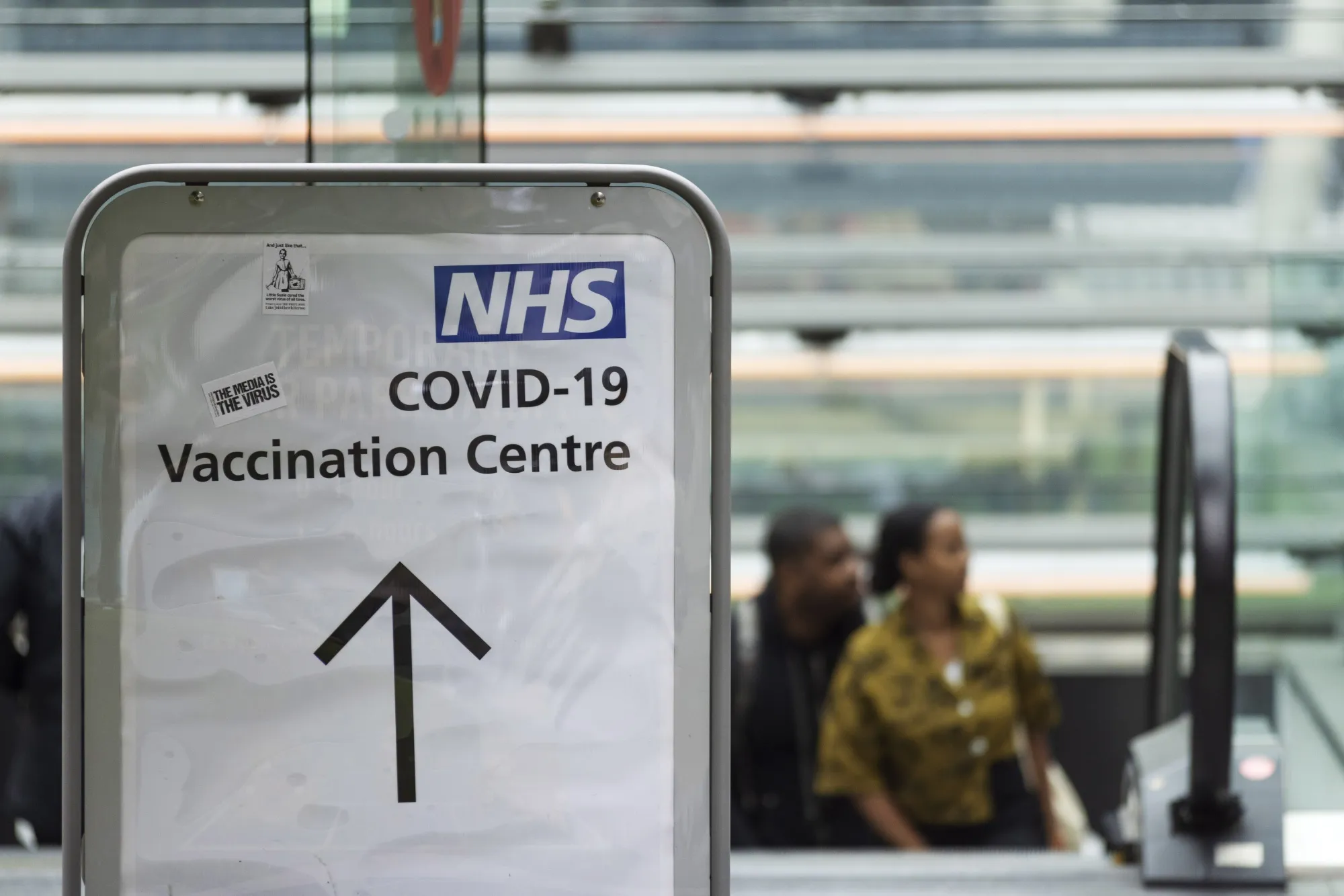 A sign for a mass vaccination event at the London Stadium.