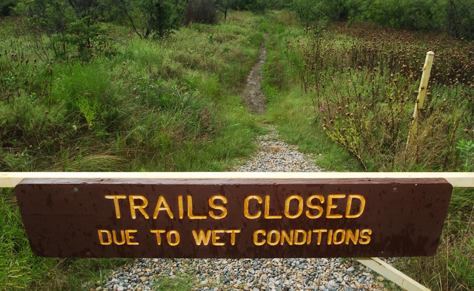This sign warns of wet conditions at Cedar Hill State Park, southwest of Dallas, Texas.