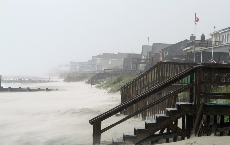 Heavy rains and wind from Hurricane Irene whip the sand on the beach at Pawleys Island, S.C., in 2011.