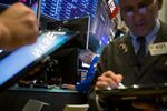 Traders work on the floor of the New York Stock Exchange (NYSE) in New York, U.S.
