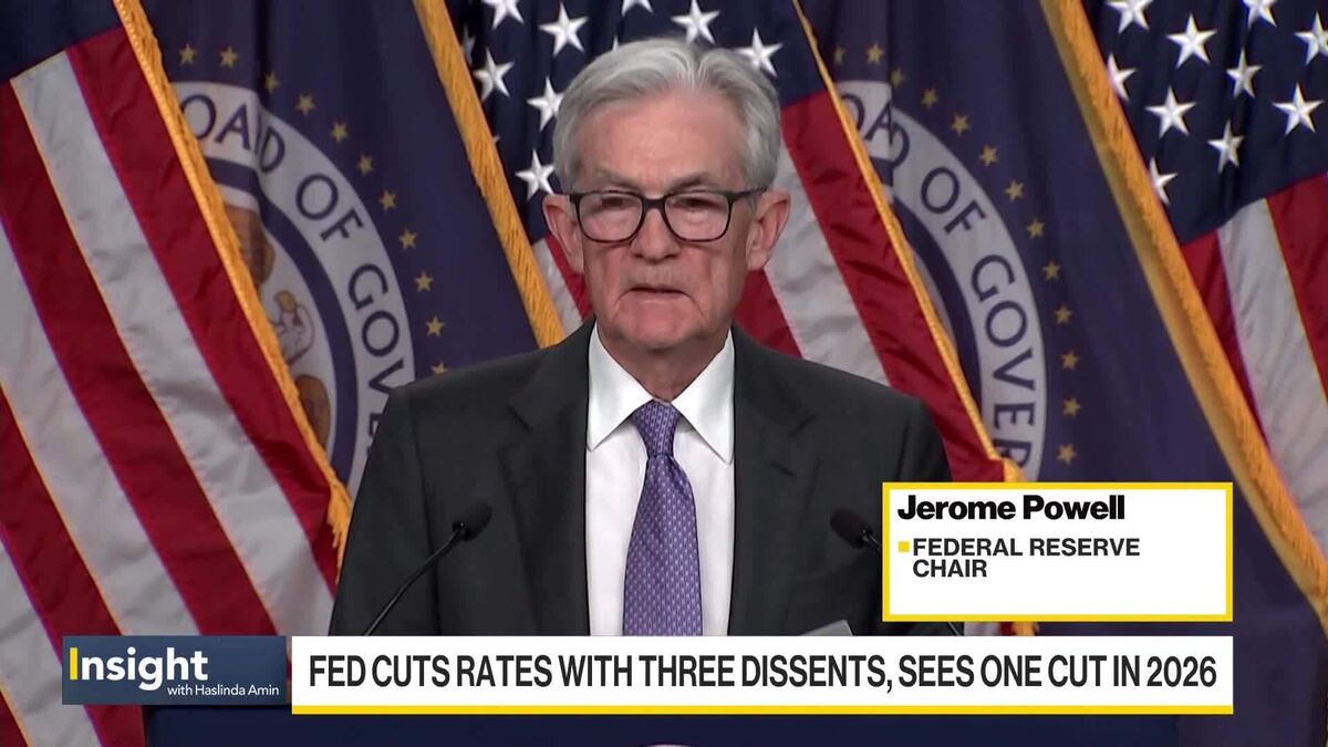 Fed's Powell Cuts Rates, Faces Dissent.