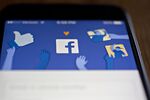 Facebook App And Logo As Crisis Reignites Washington Scrutiny Of Social Networks