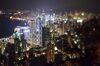 The Bank of China Tower, center left, and other commercial buildings stand illuminated at night in this photograph taken with a tilt-shift lens at night in Hong Kong, China on Friday, Nov. 27, 2015. Secondary private residential property prices dropped 3.9 percent since peaking in September, according to an index published by broker Centaline Property Agency Ltd.
