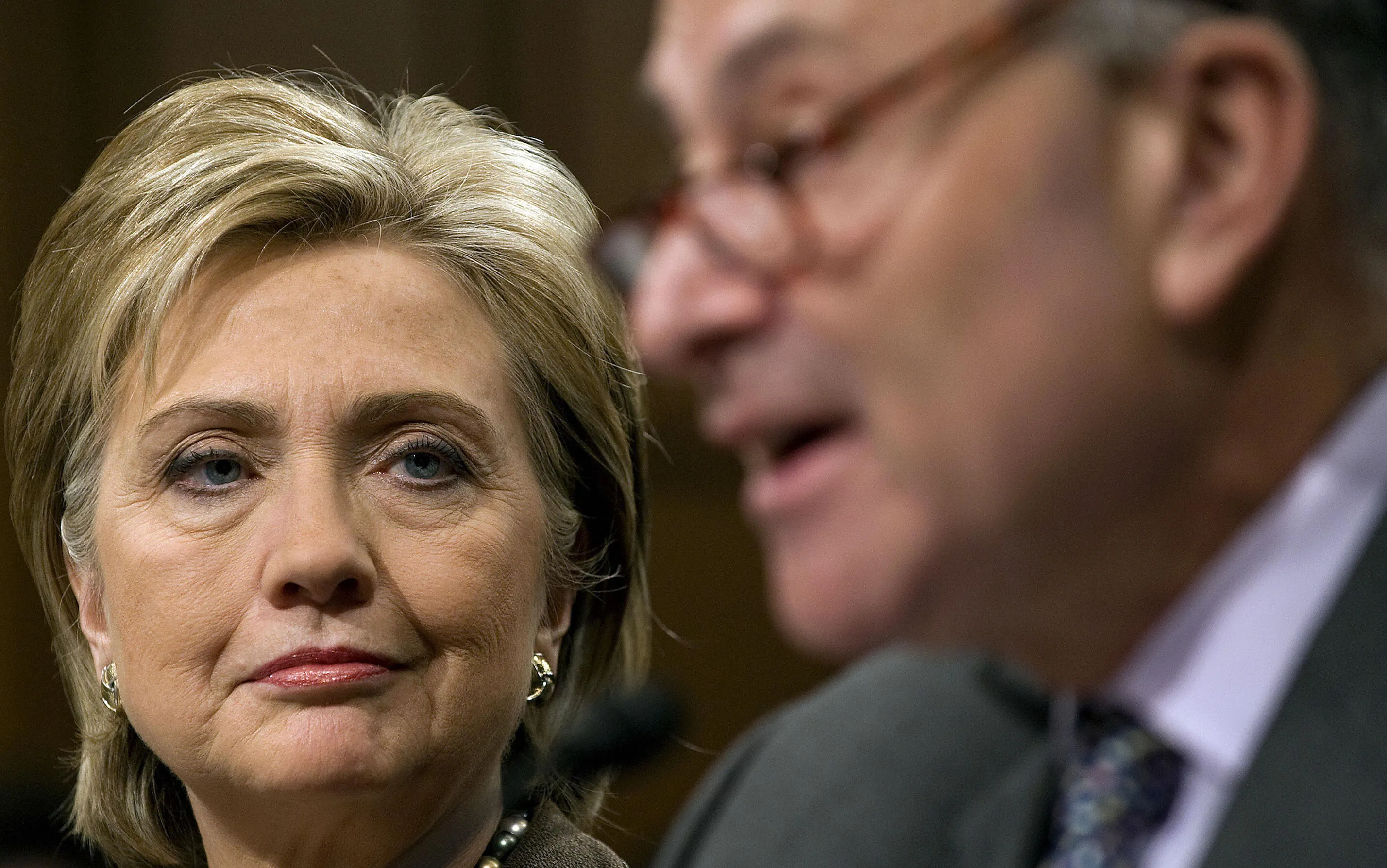 US Senator Charles Schumer (R), D-NY, introduces US Secretary of State designate Senator Hillary Rodham Clinton (L) at the beginning of Clinton's confirmation hearing on Capitol Hill in Washington, DC, January 13, 2009. AFP PHOTO/Jim WATSON (Photo credit should read JIM WATSON/AFP/Getty Images)
