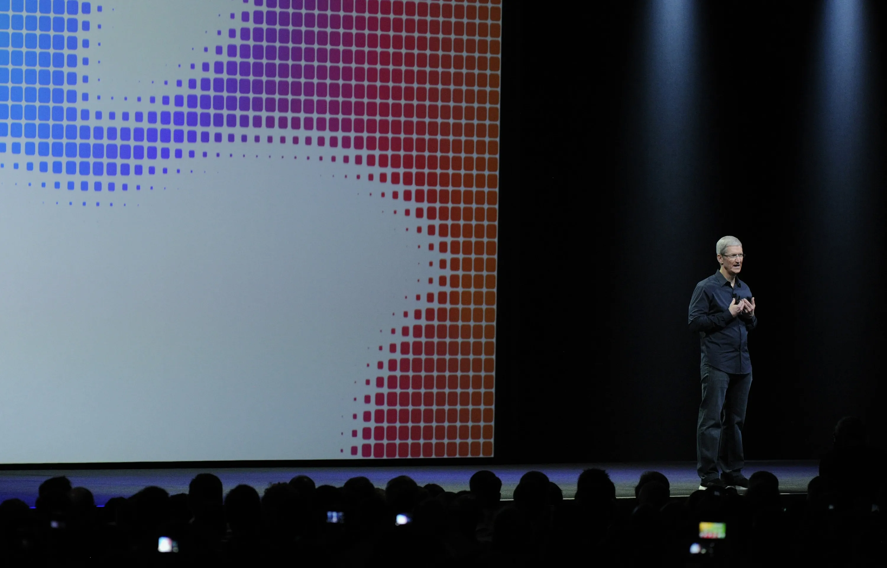 Tim Cook, chief executive officer of Apple Inc., delivers a keynote address during the Apple World Wide Developers Conference in San Francisco, California, on June 2, 2014. Photographer: David Paul Morris/Bloomberg
