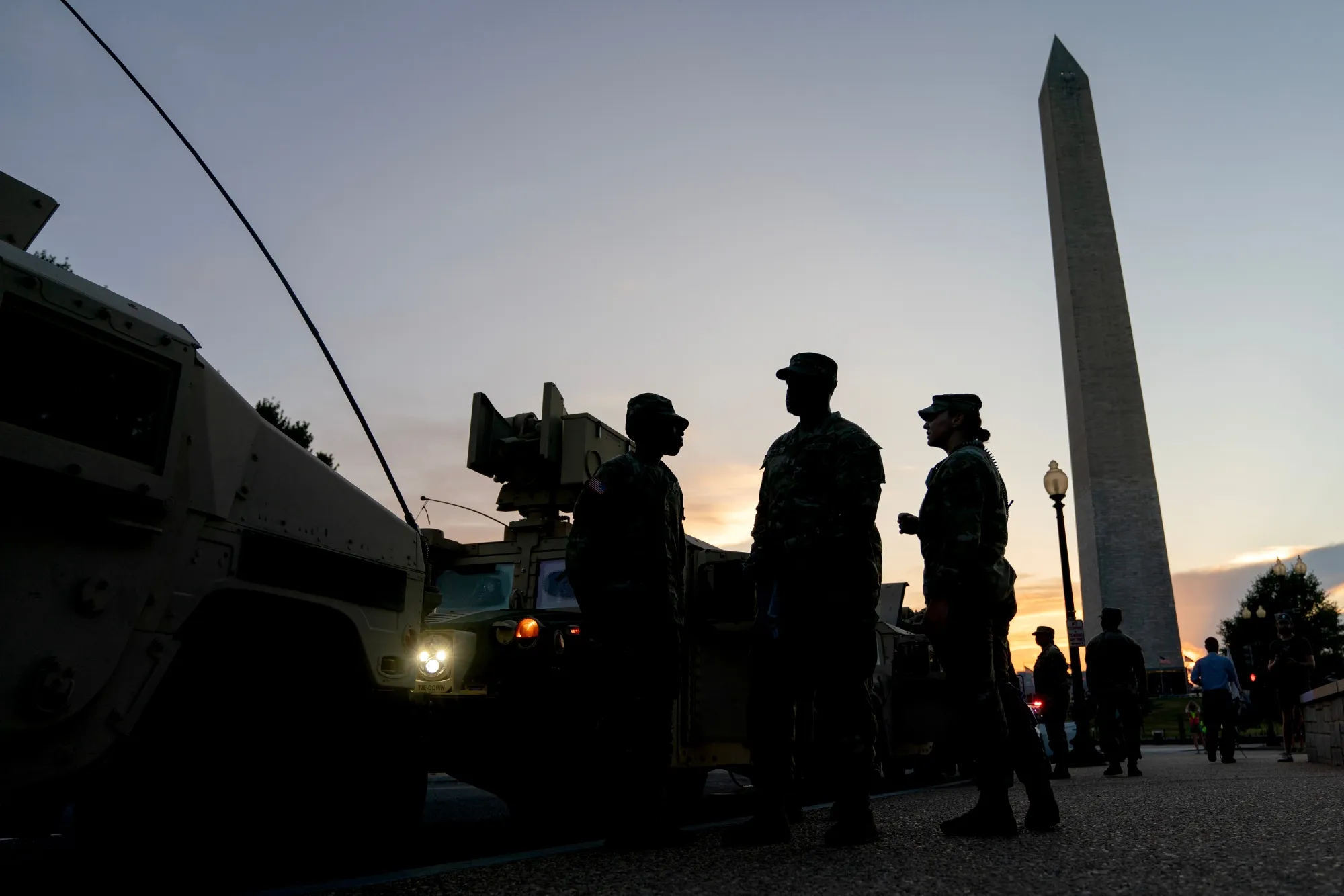Members of the National Guard and armored vehicles near the Washington Monument in Washington on Aug. 12.