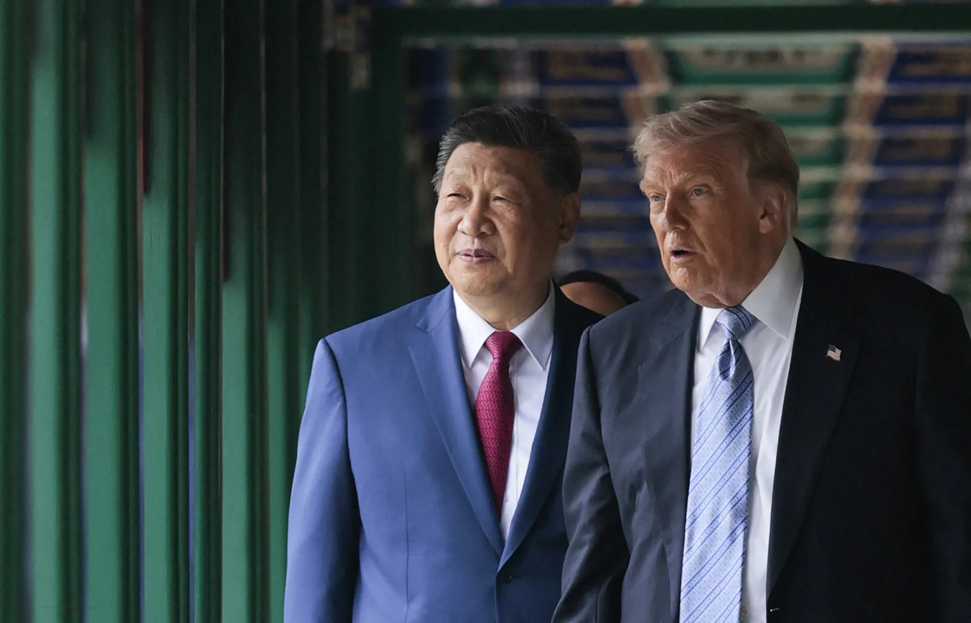 Donald Trump walks with Xi Jinping&nbsp;at Zhongnanhai Garden in Beijing on May 15.