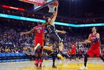 Golden State Warriors goes in for a layup over&nbsp;the New Orleans Pelicans during an NBA basketball game at ORACLE Arena.