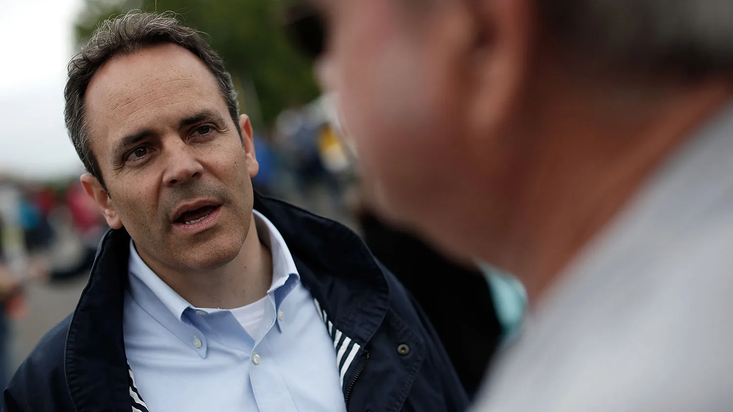Matt Bevin talks with voters at the Fountain Run BBQ Festival while campaigning for the Republican Senate primary on May 17, 2014 in Fountain Run, Kentucky.
