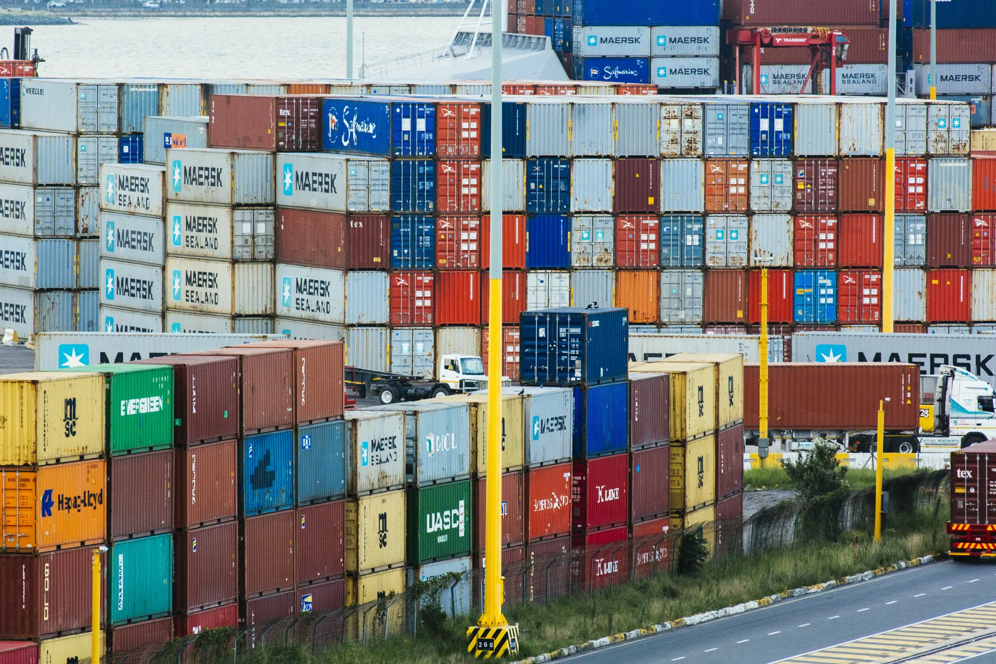 Shipping containers stand stacked at the container terminal at the Port of Durban.