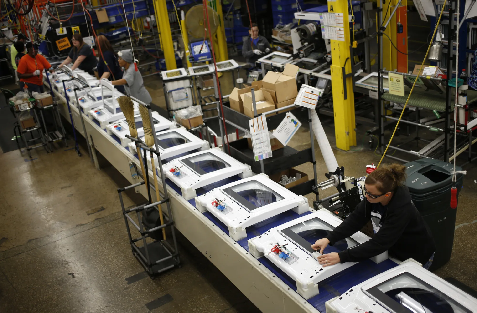 Workers assemble washing machines at the Whirlpool Corp. manufacturing facility in Clyde, Ohio.