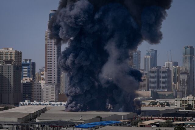 Smoke rises from a warehouse at the industrial area of Sharjah City in the United Arab Emirates on March 1.