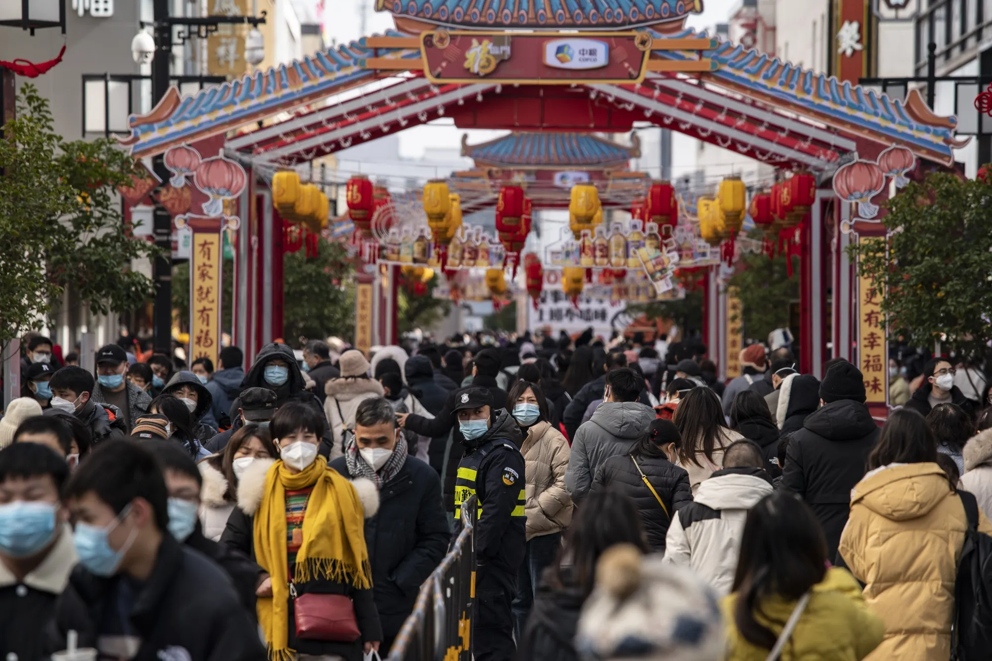 Shoppers at the Guanqian Street shopping area in Suzhou on Jan. 25.
