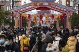 Shoppers in Suzhou as China Holiday Travel, Box Office Rebound After Covid Zero