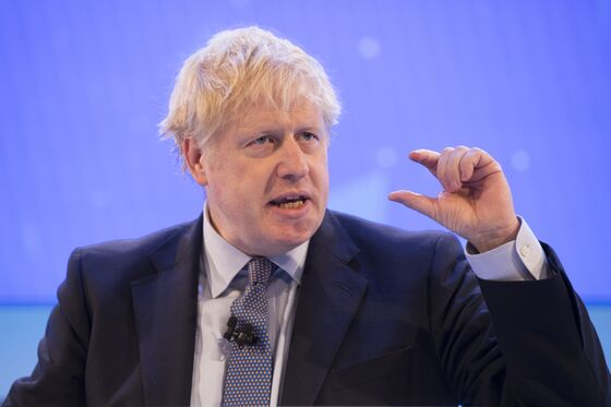 Johnson’s Conservatives Pledge to Lock U.K. Income Tax Rates