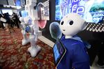 SoftBank Group Corp. Pepper humanoid robota stand during the SoftBank World 2019 event in Tokyo.