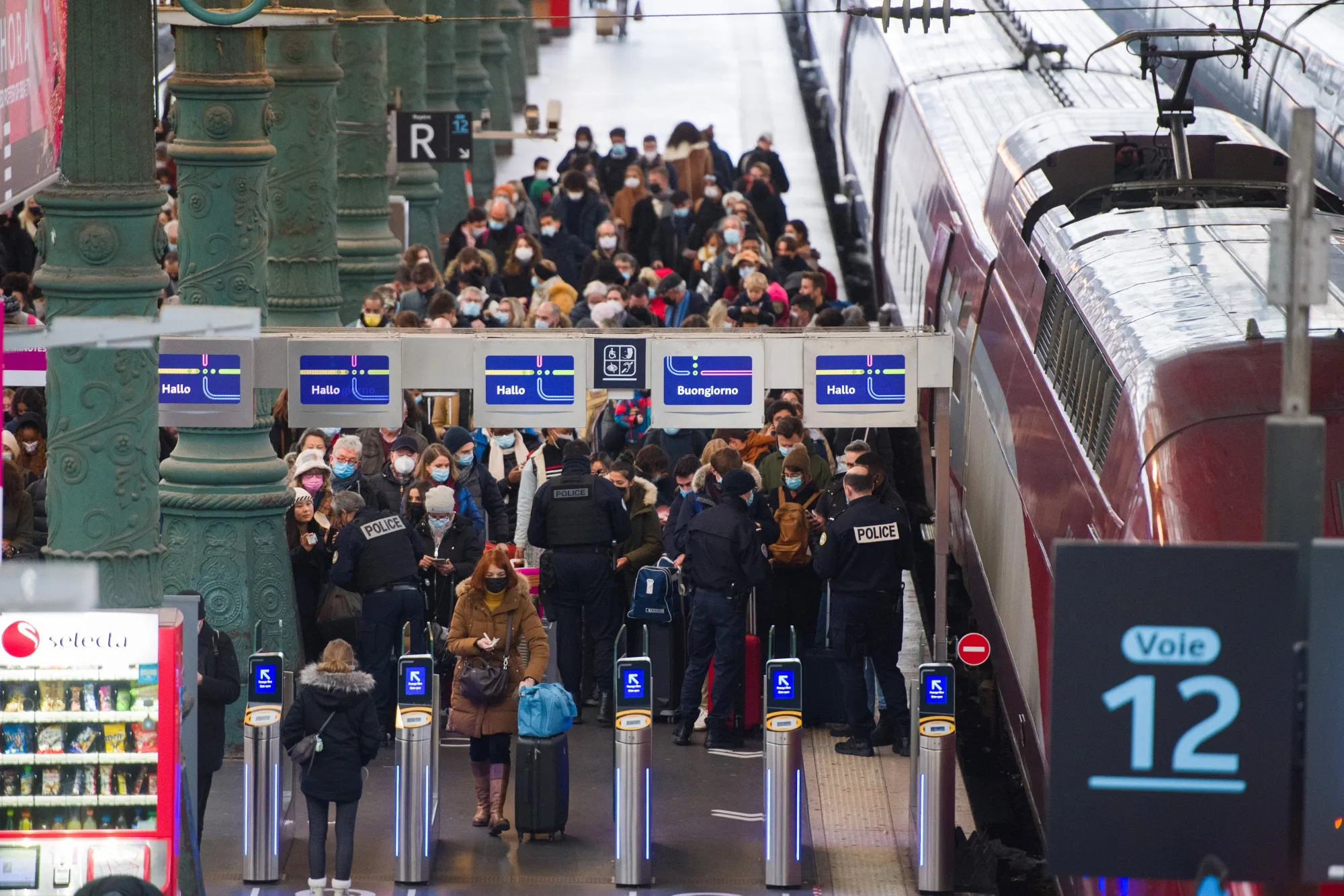 French border police check the Covid health passes of travelers on the Thalys arrivals platform at Gare du Nord train station in Paris, France, on Dec. 20.