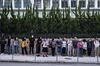 Demonstrators form a human chain during a protest in the Central district of Hong Kong, China, on Sunday, Nov. 17, 2019.