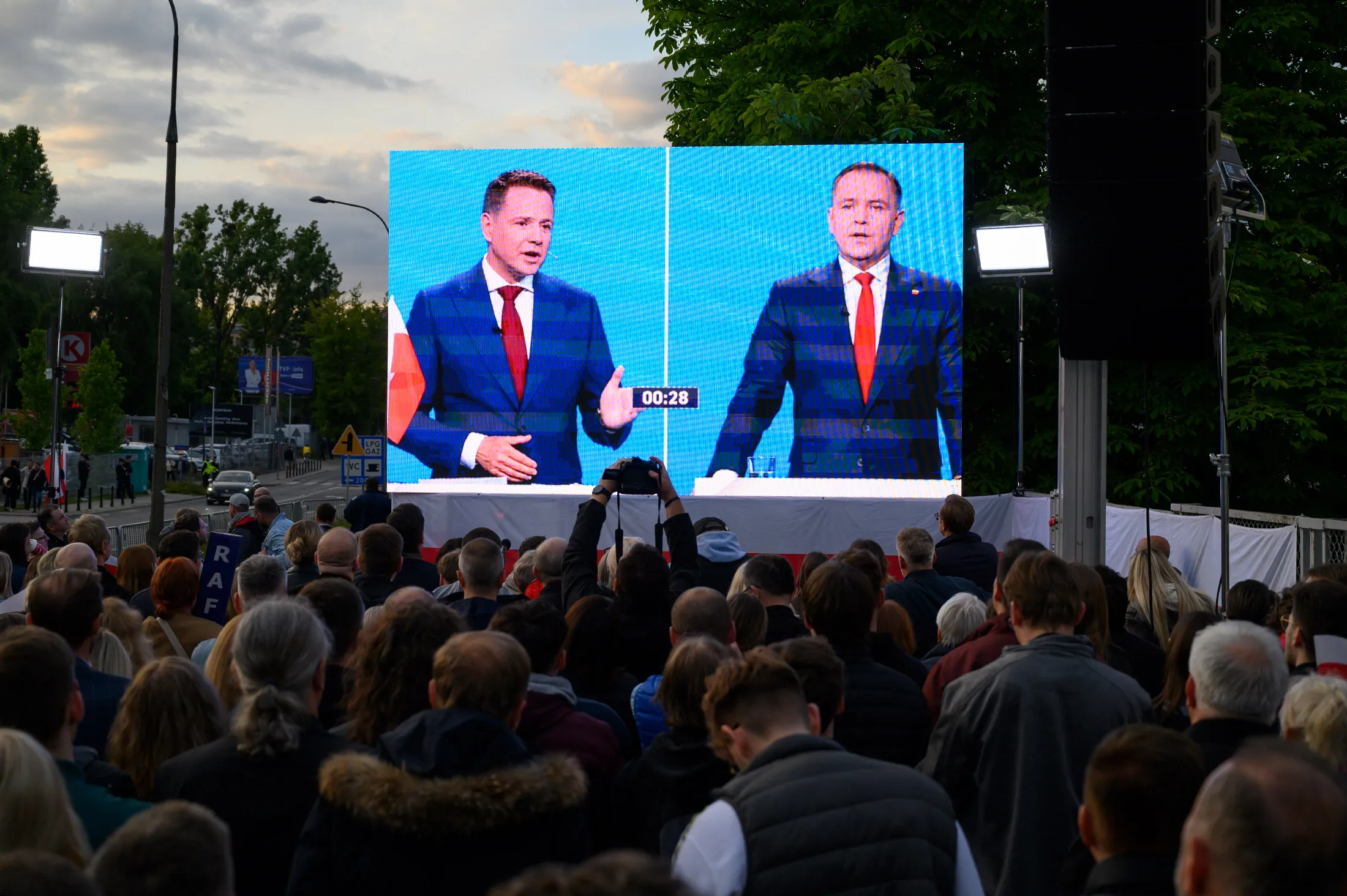 A screen displays a televised presidential debate between&nbsp;Rafal Trzaskowski, left, and&nbsp;Karol Nawrocki in Warsaw, Poland, on May 23.