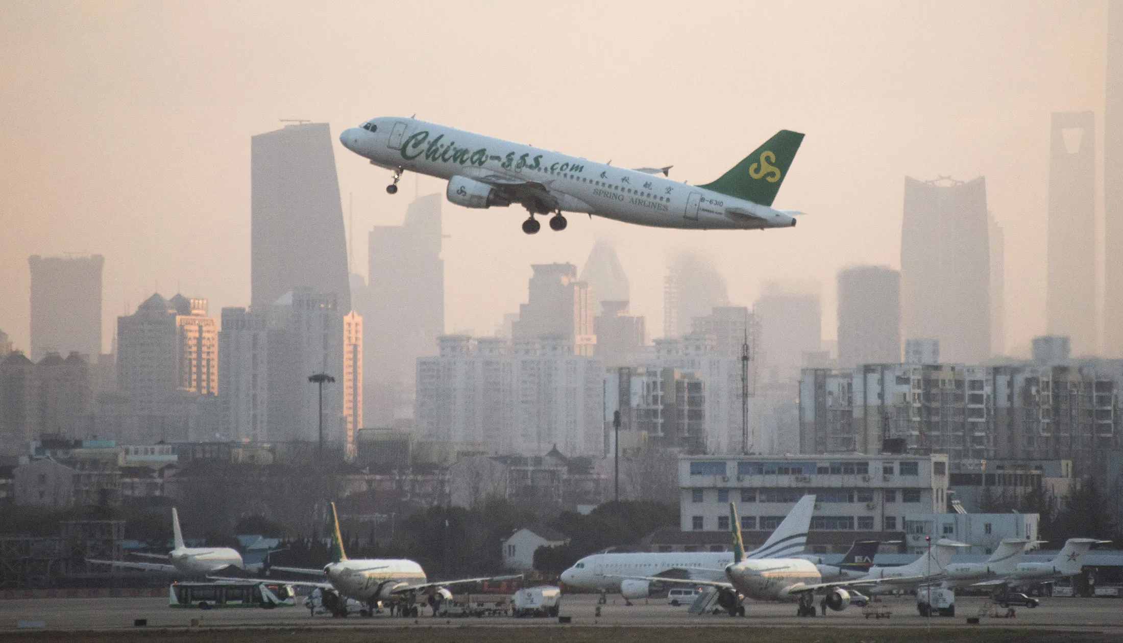 A plane from Chinese airline Spring Airlines departs from Hongqiaou Airport in Shanghai on Feb. 8.
