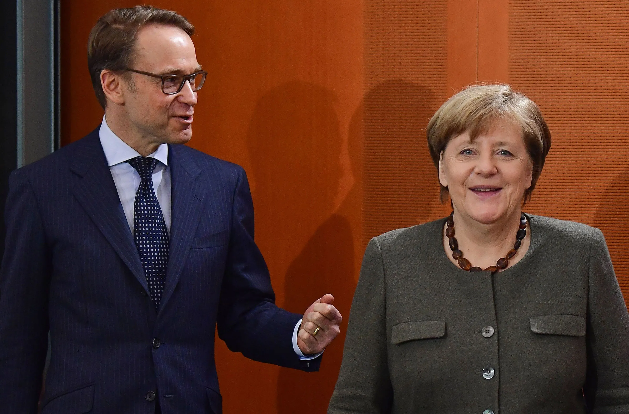 Jens Weidmann and Angela Merkel.&nbsp;