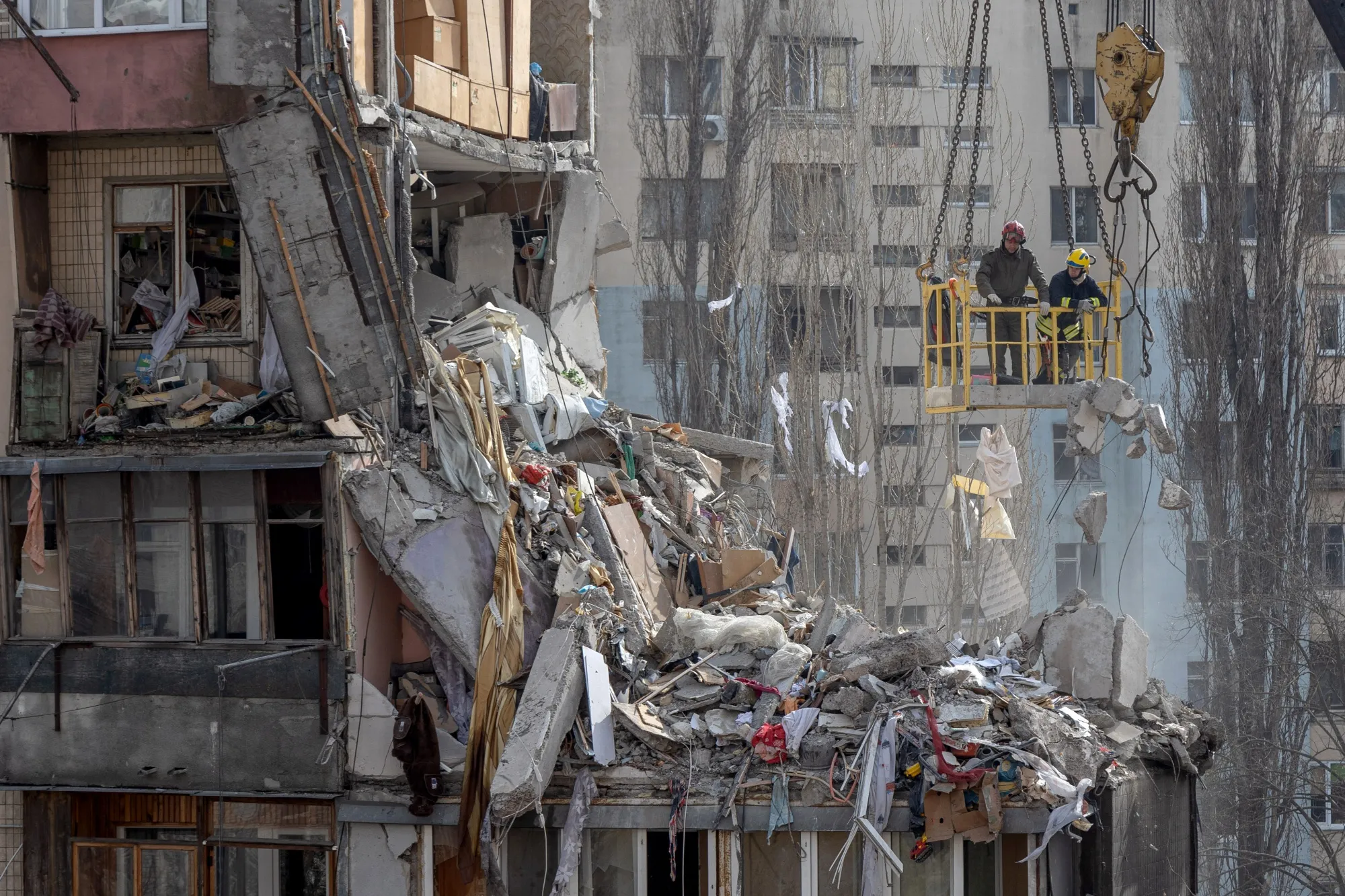 Rescuers clear debris from a&nbsp;building heavily damaged following a drone strike&nbsp;in Odesa on March 3.