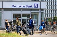 Deutsche Bank AG Branches After First Loss in Four Years