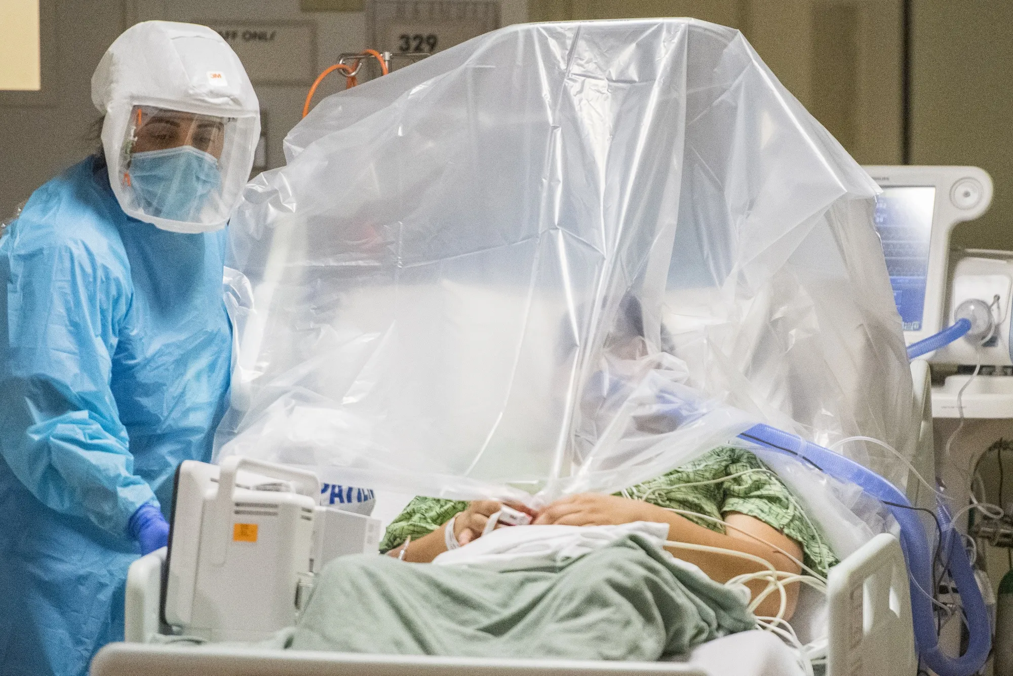 A healthcare worker prepares to move a patient at a Covid-19 ICU&nbsp;in Salinas, California,&nbsp;on&nbsp;Jan. 26.&nbsp;