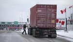 A driver heads back to his truck at the Canada-U.S. border crossing between St-Bernard-de-Lacolle, Quebec, and New York state on Jan. 14.