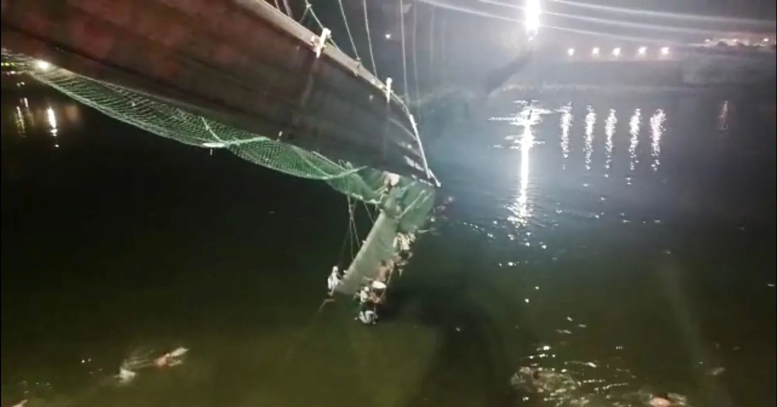 A suspension bridge collapses in India’s Gujarat state on Oct. 30.