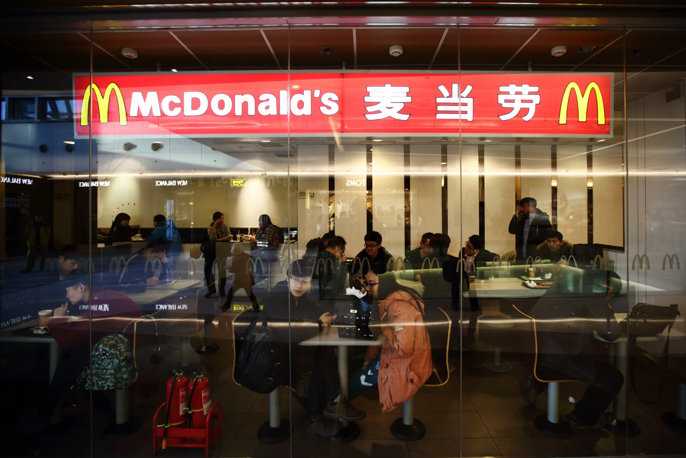 Customers dine inside a McDonald's Corp. restaurant in Beijing.