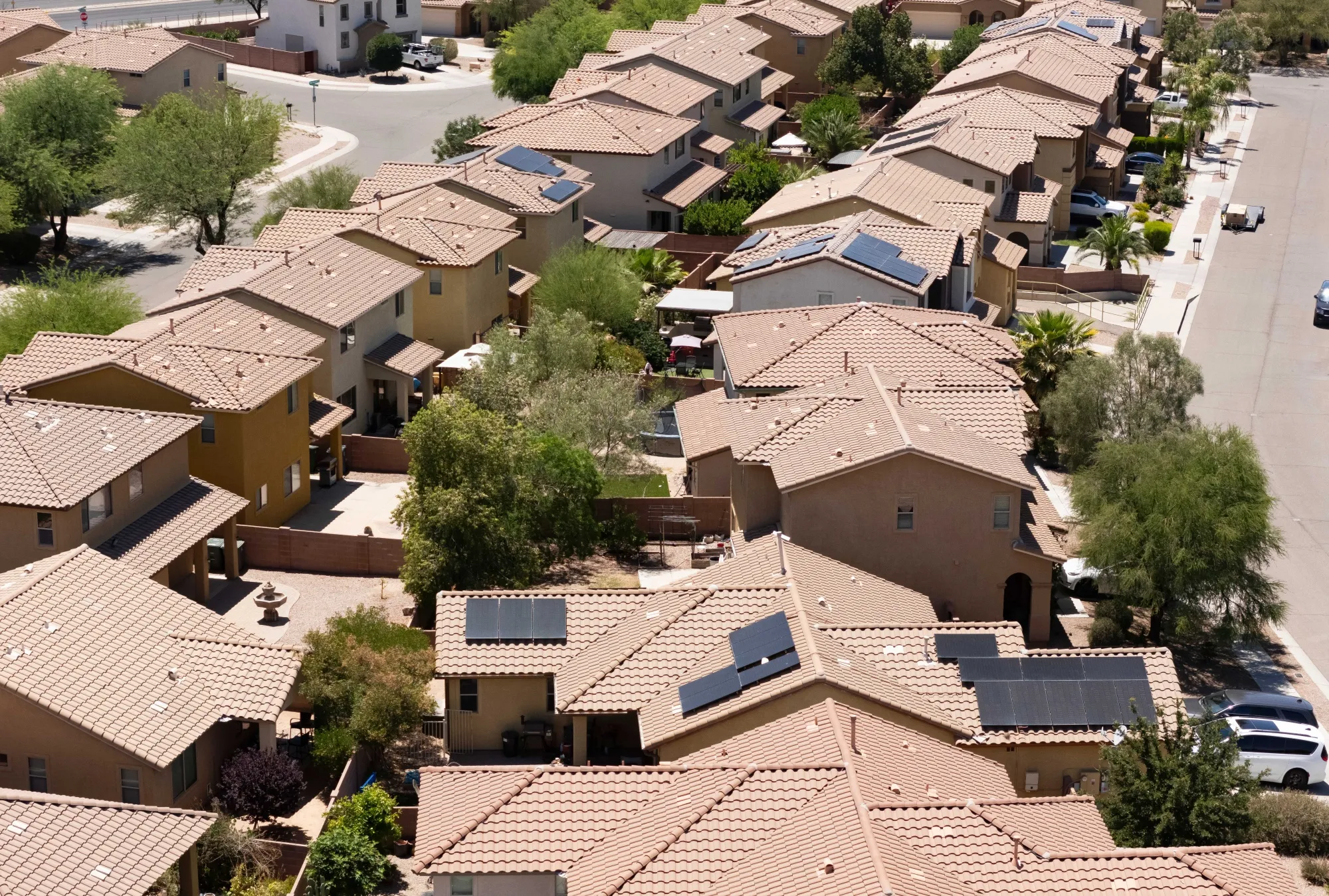 Solar panels on the roofs of homes in Tucson, Arizona.