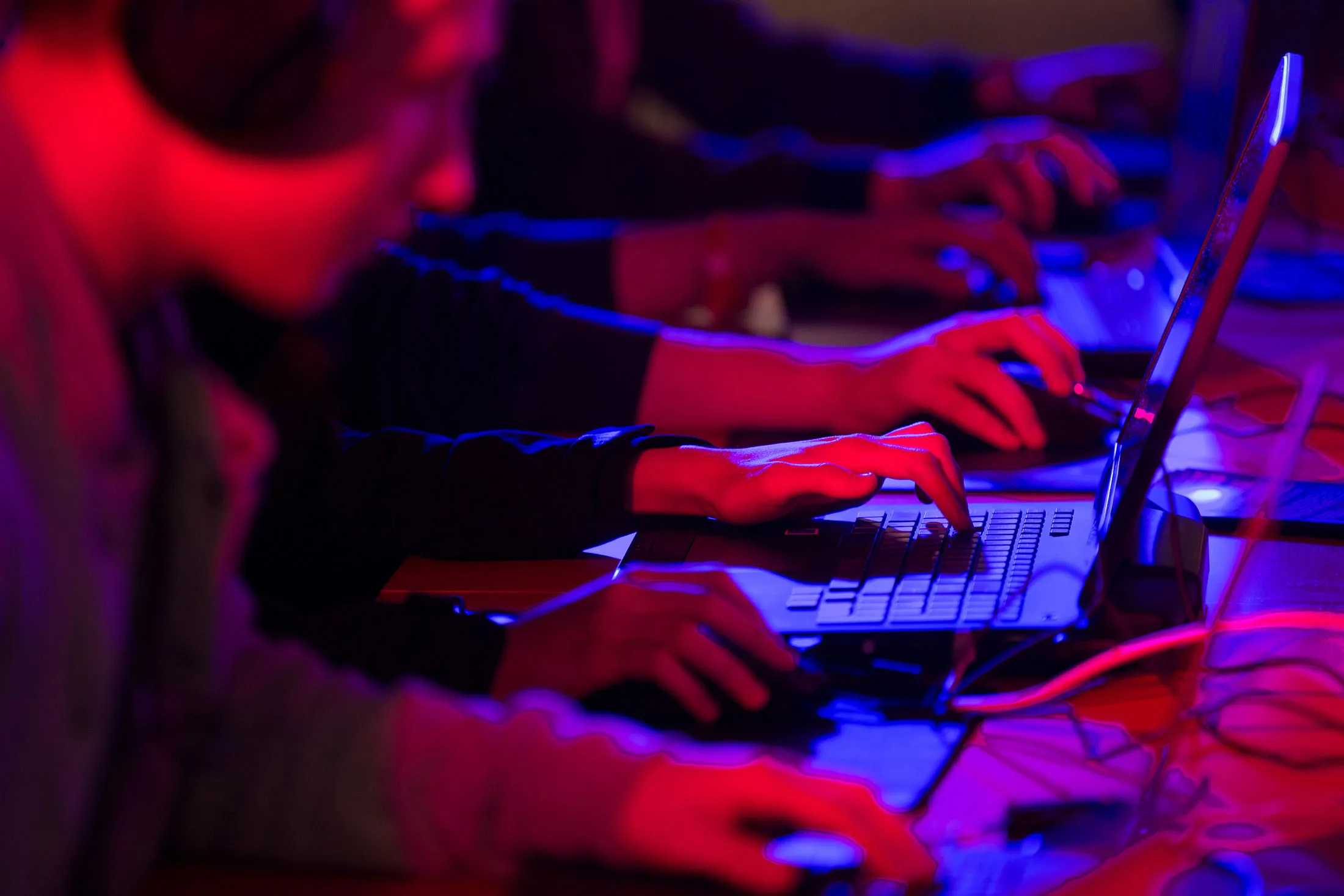 Gamers play video games on laptop computers at the Dreamhack digital festival in Moscow, Russia, on Saturday, Dec. 5, 2015. Dreamhack is the world's largest digital festival and meeting place for gamers, fans and e-sport enthusiasts.
